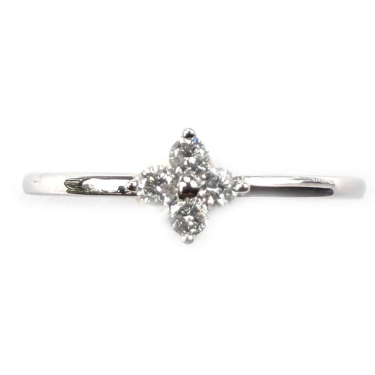 Anillo en oro blanco 14K con florcita de cuatro diamantes 0.11ctw