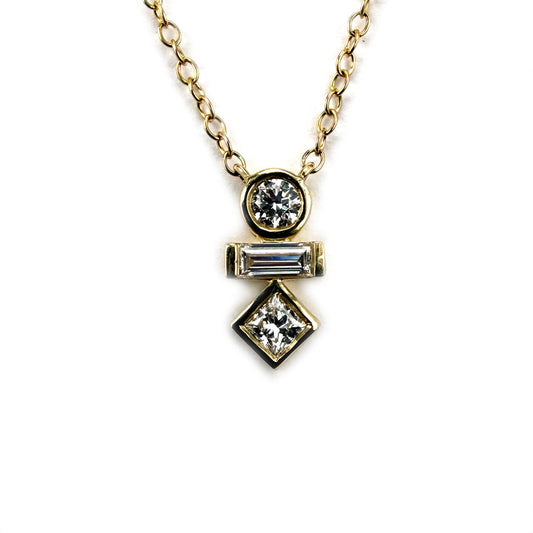 Collar en oro amarillo 10K con dije de varias formas de diamantes de laboratorio 0.25ctw