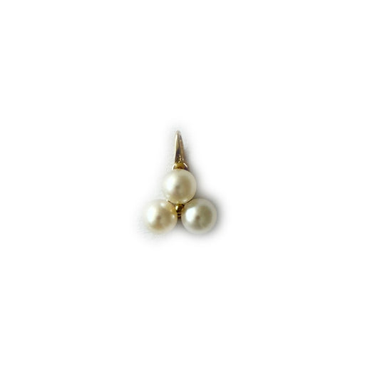 Dije de oro amarillo 14k con tres perlas