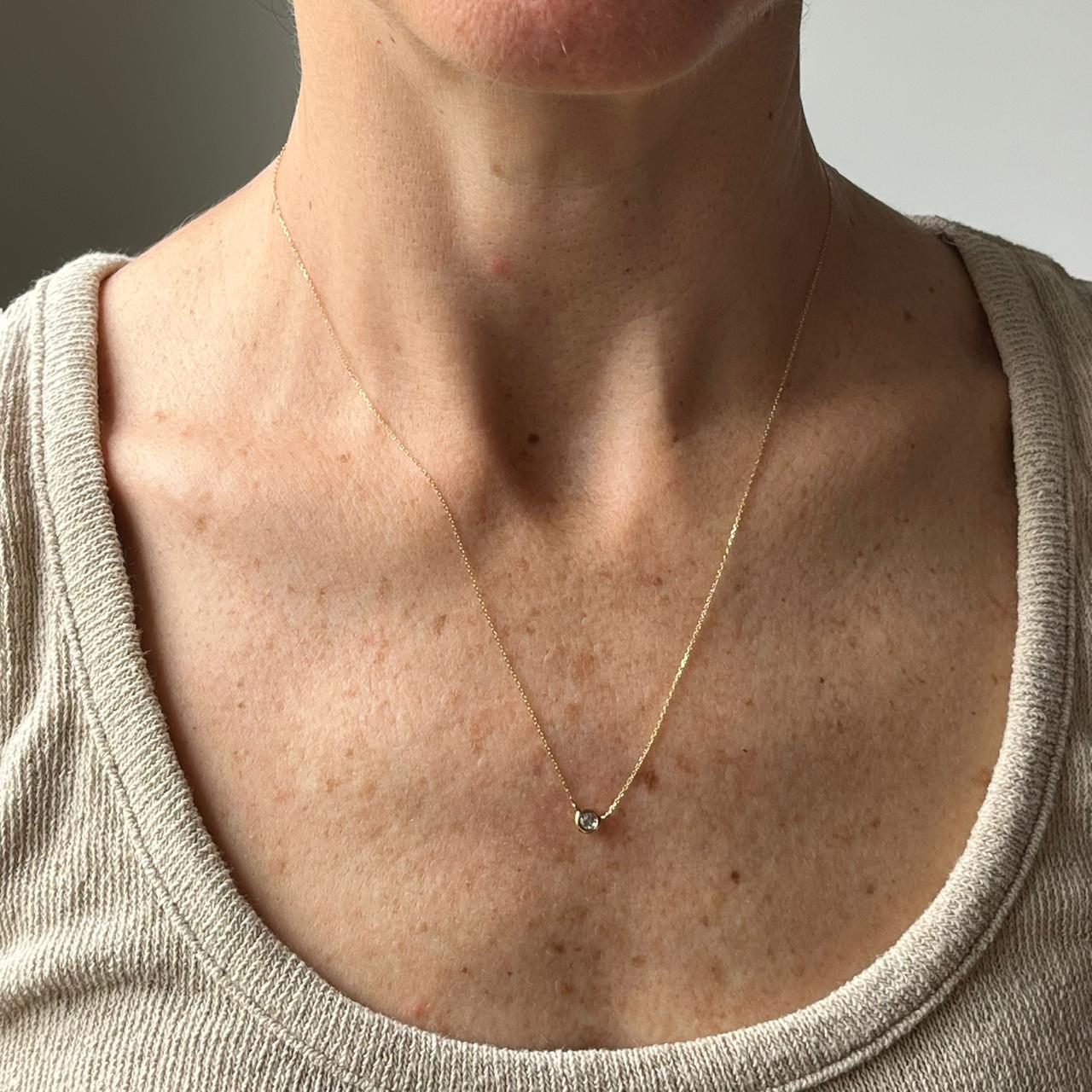 Collar en oro amarillo 14K con aquamarina biselada