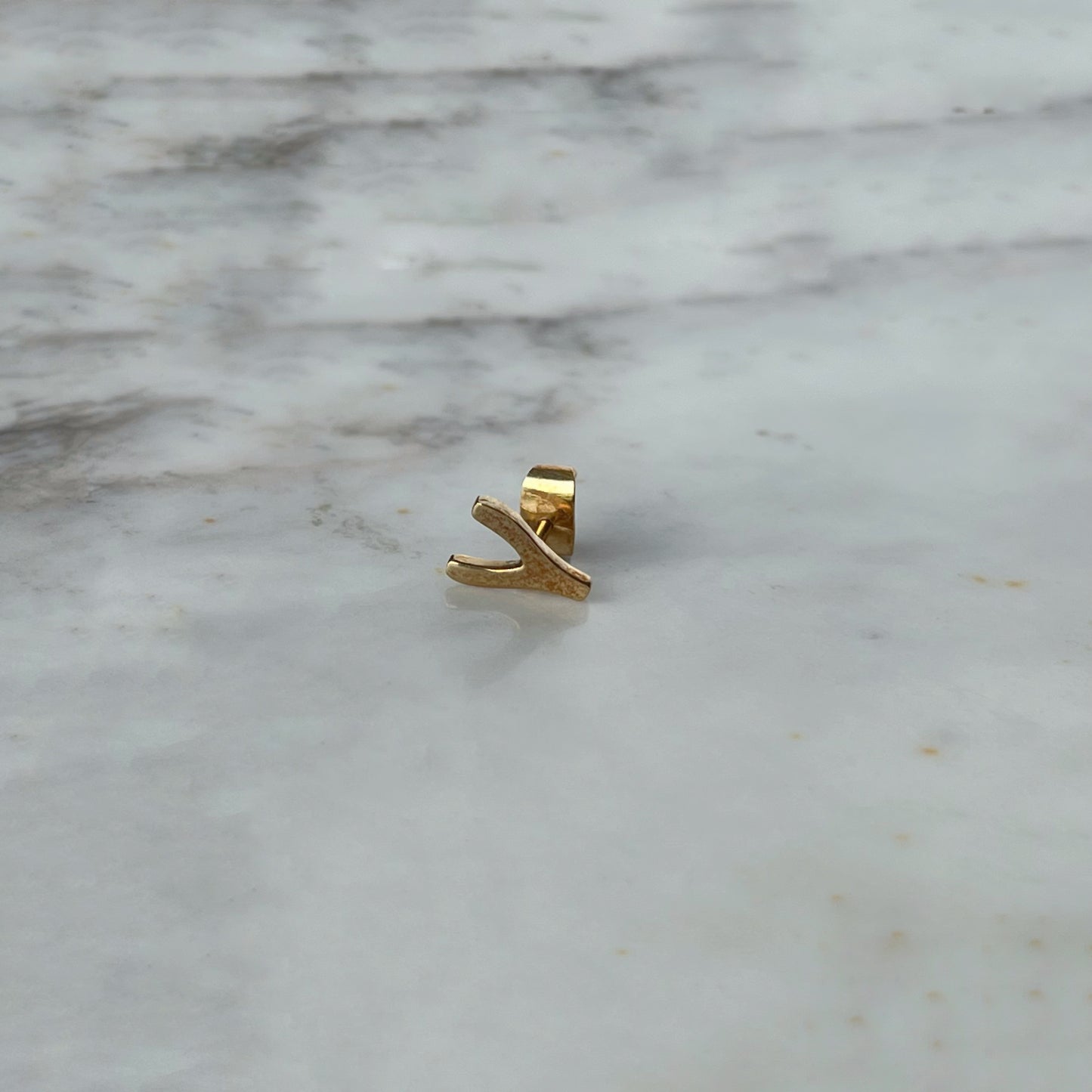 Wishbone 18k gold single earring