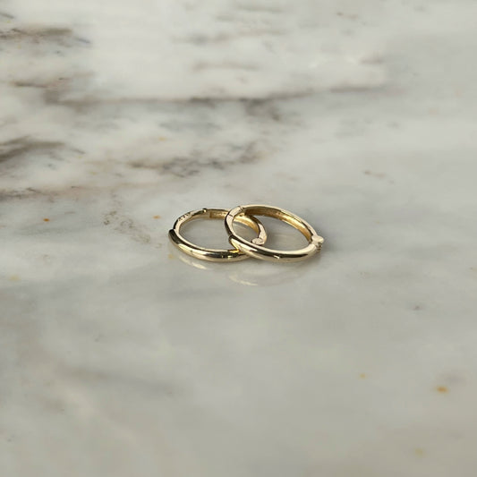 Argollas mini de oro amarillo 14k