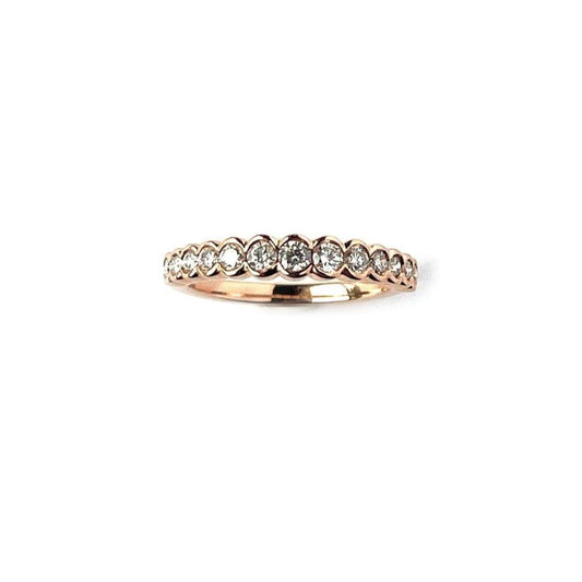 Anillo en oro rosa 14k con diamantes graduados biselados 0.50ctw