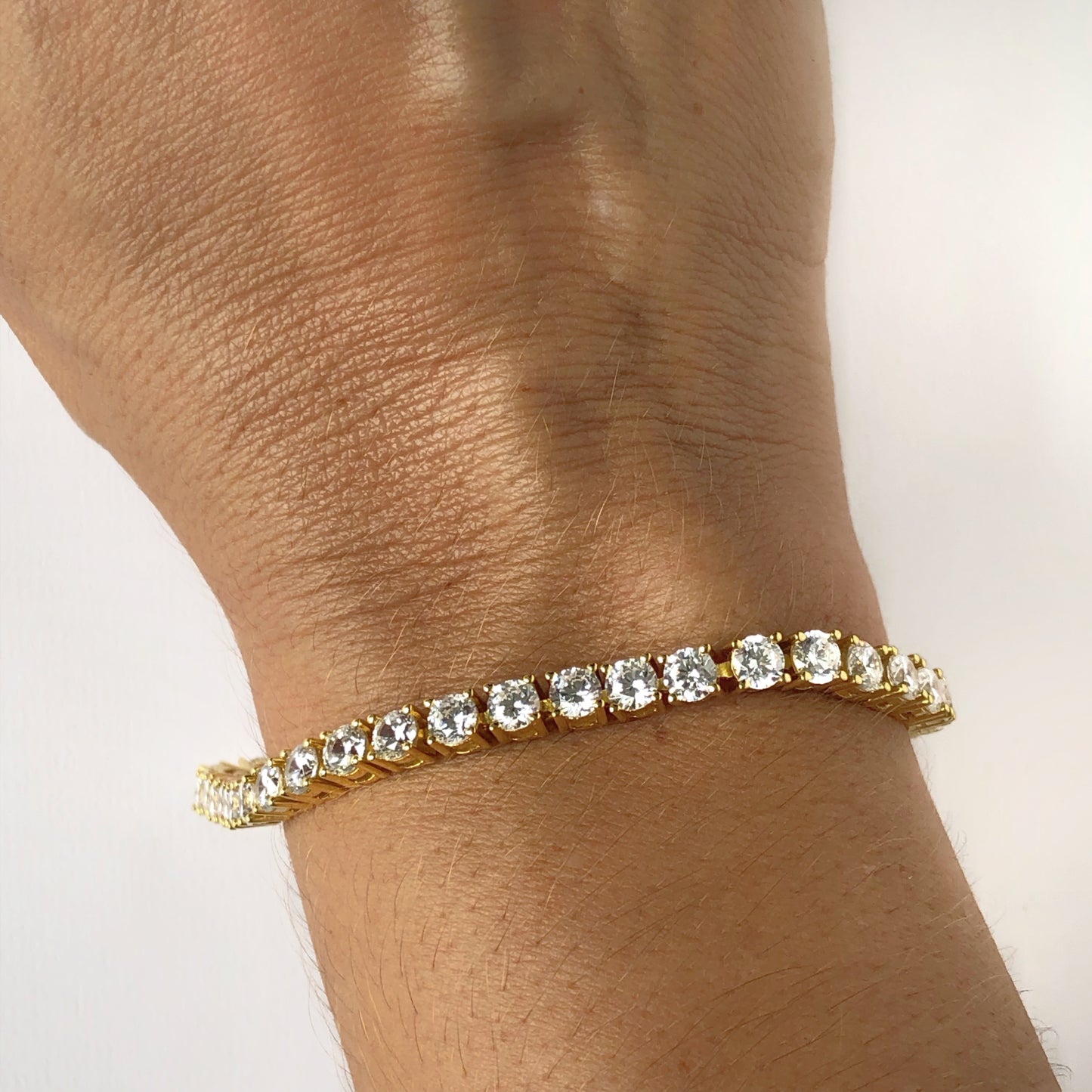 Silver tennis bracelet with gold-plated and zircons